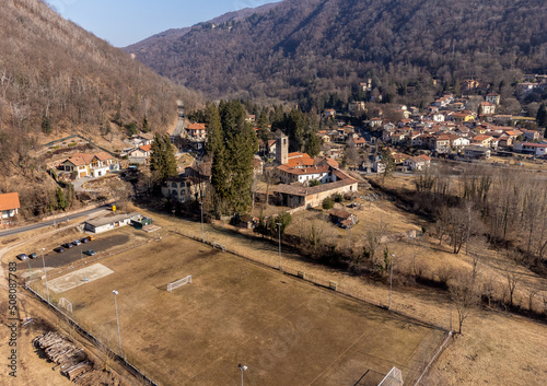 Aerial view of small Italian village Ganna at winter season, situated in province of Varese, Lombardy, Italy