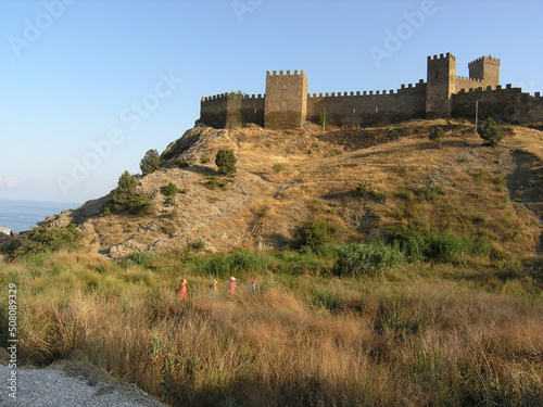 View of the old Genoese fortress in Sudak on a sunny summer evening