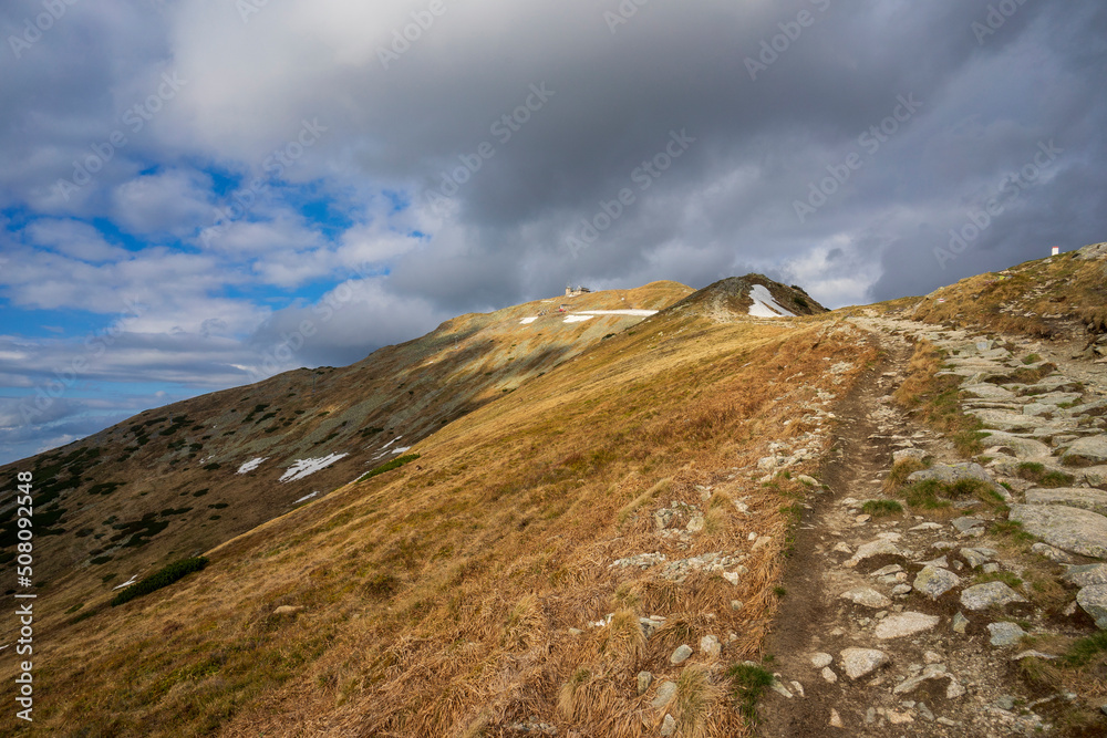 The peak of Kasprowy Wierch in the sunlight. Tatry. The peak of Kasprowy Wierch in the sunlight. Tatry.