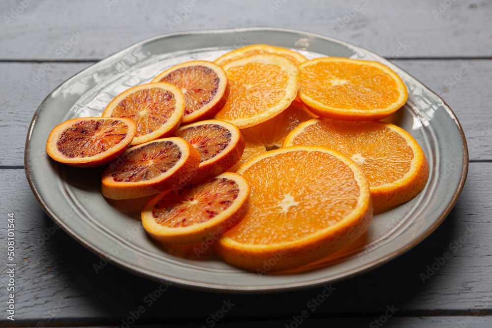 circular slice of oranges on a plate circular slice of oranges on a plate