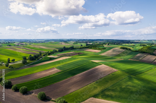 Colorful Lush Crop Fields in Rural Counrtyside Landscape. Aerial Drone View. Polish Farmlands