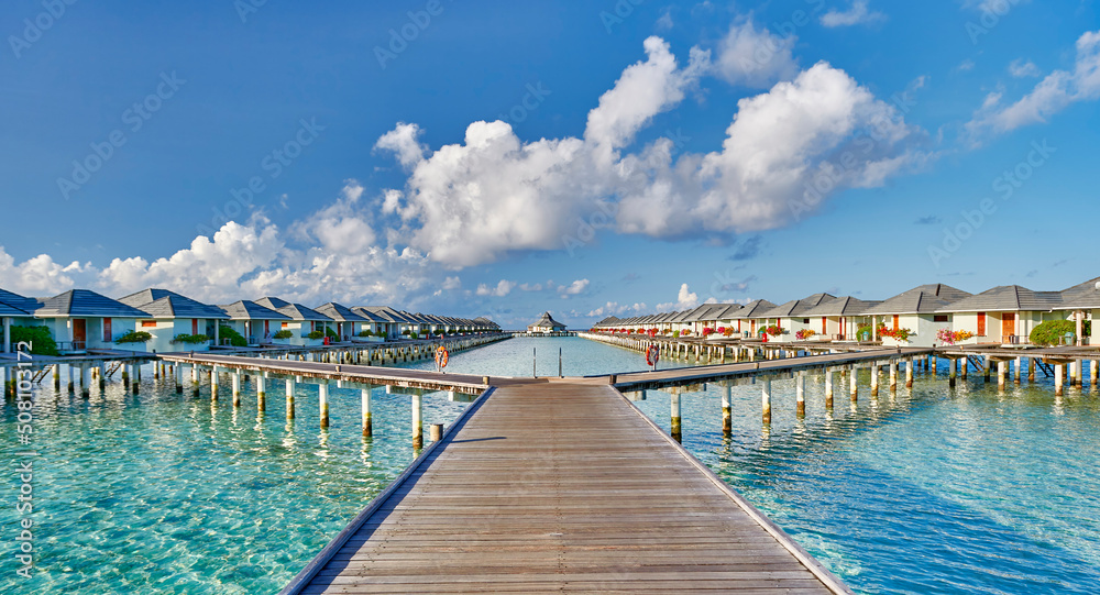 Fototapeta premium Travel, tourism and relaxation in the resort of the Maldives. Paradise tropical beach. Paradise tropical beach. The best place for holidays and health
