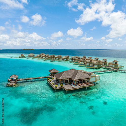Fototapeta Naklejka Na Ścianę i Meble -  Travel, tourism and relaxation in the resort of the Maldives. Paradise tropical beach. Paradise tropical beach. The best place for holidays and health