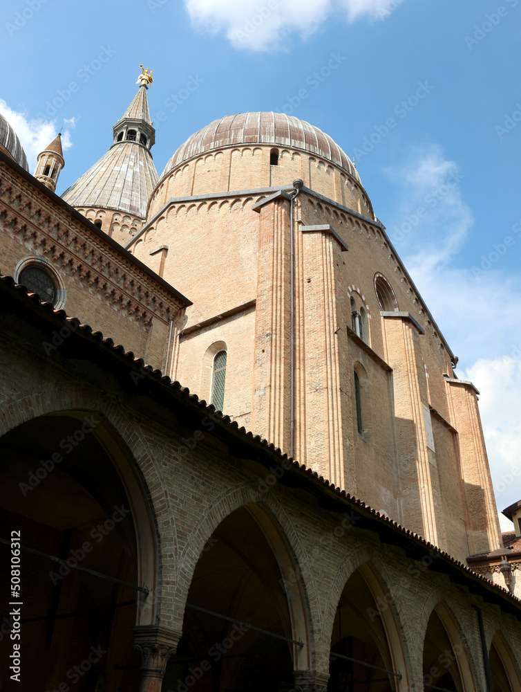 Basilica of Saint Anthony of Padua in the Veneto Region in Northern Italy in Europe with dome and architectural arches in the inner courtyard