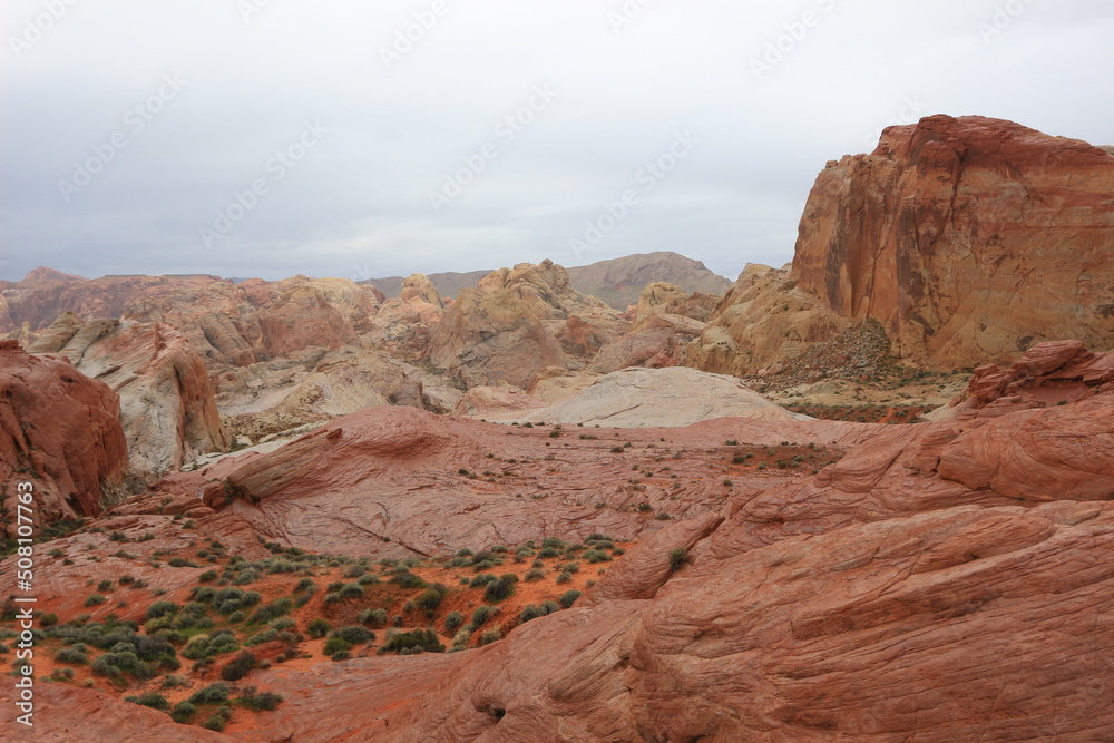 red and yellow mountains and sand in the valley of fire red and yellow mountains and sand in the valley of fire