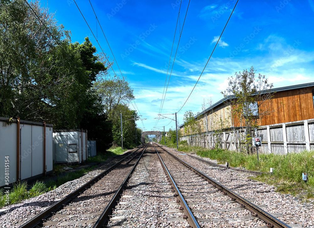 The Northern railway line in Cononley, as it heads toward Morecambe, on a sunny day in, Cononley, Keighley, UK