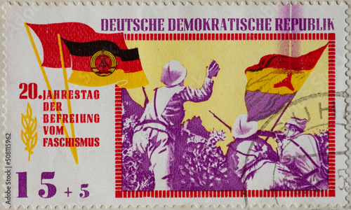 GERMANY, DDR - CIRCA 1965: a postage stamp from GERMANY, DDR, showing fighting soldiers of the anti-fascist International Brigades in the Spanish Civil War. Circa 1965