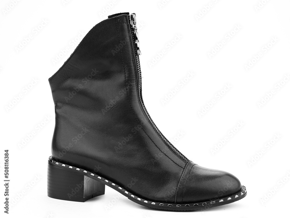 Women's autumn black leather jodhpur boots with zip and average heels, isolated white background. Right side view. Fashion shoes.