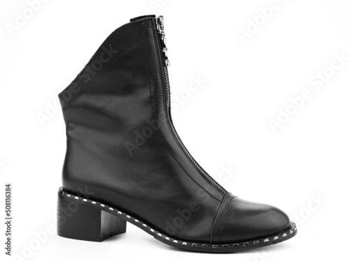 Obraz na płótnie Women's autumn black leather jodhpur boots with zip and average heels, isolated white background. Right side view. Fashion shoes. w salonie