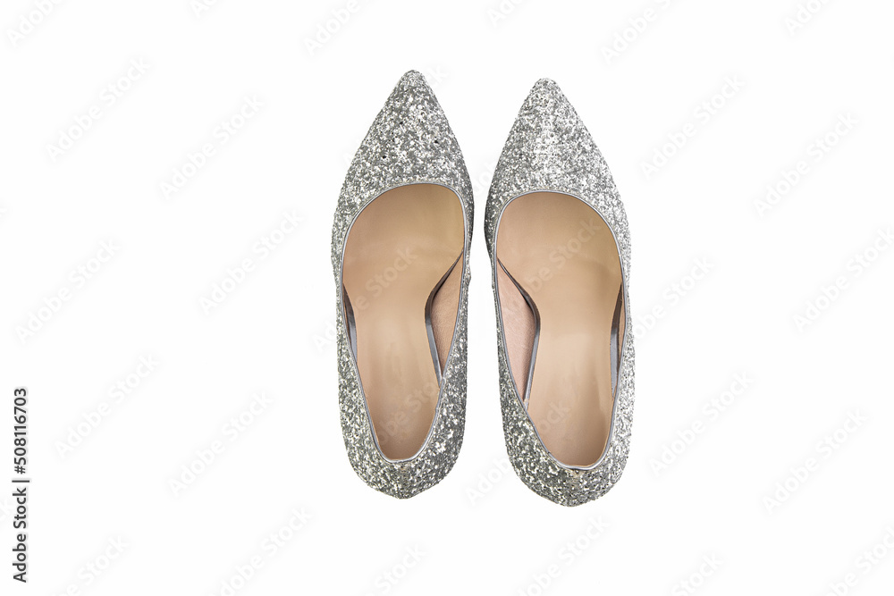 Classic and elegant high-heeled women shoes. Isolated object close up on white background. Top view. Fashion shoes.