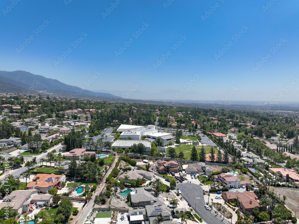Aerial view of wealthy Alta Loma community and mountain range, Rancho Cucamonga, California, United States