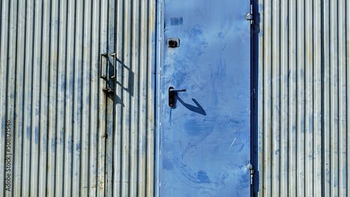 large metal door from warehouse building