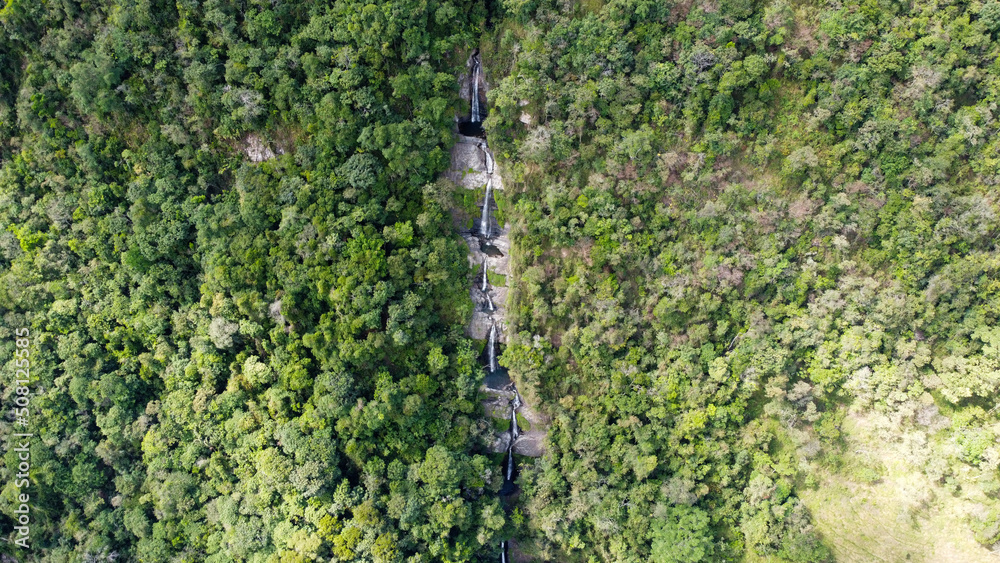 Fototapeta premium waterfalls flowing down a large mountain in colombia