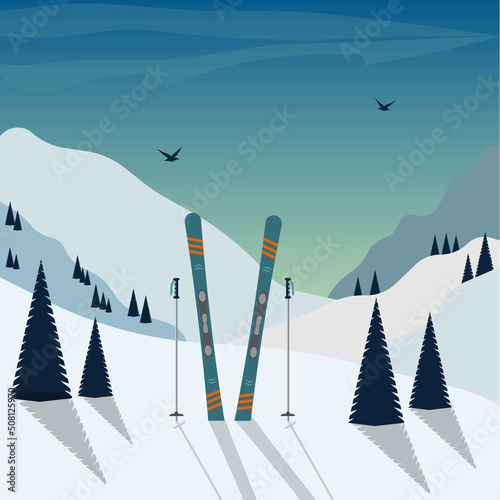 winter themed template with  skis and poles in the snow with snowy mountains and clear sky on background. Mountain landscape, with  skiing equipment in front 