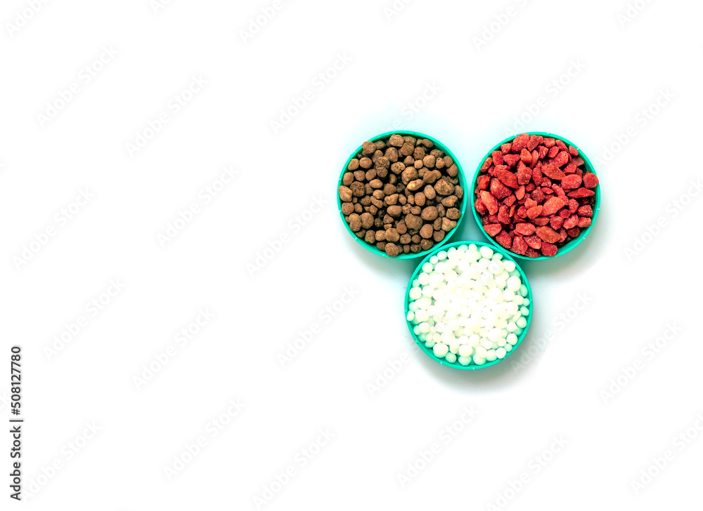 fertilizer on white background with clipping path. The concept of plant care is the need for feeding with various fertilizers. Text N, P, K fertilizer on white background with clipping path. The concept of plant care is the need for feeding with various fertilizers. Text N, P, K