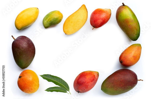 Tropical fruit, Frame made of mango with leaves on white background. Top view