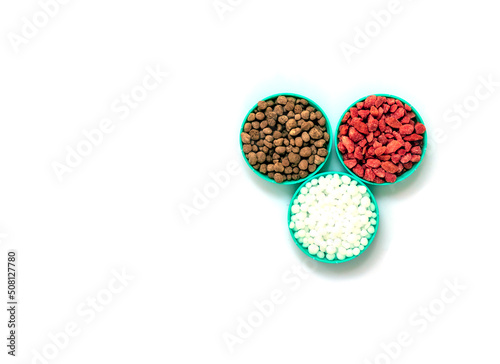 fertilizer on white background with clipping path. The concept of plant care is the need for feeding with various fertilizers. Text N  P  K