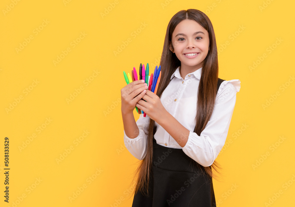 Back to school supplies. Happy kid hold felt-tip pens. Back to school. Creative education Back to school supplies. Happy kid hold felt-tip pens. Back to school. Creative education
