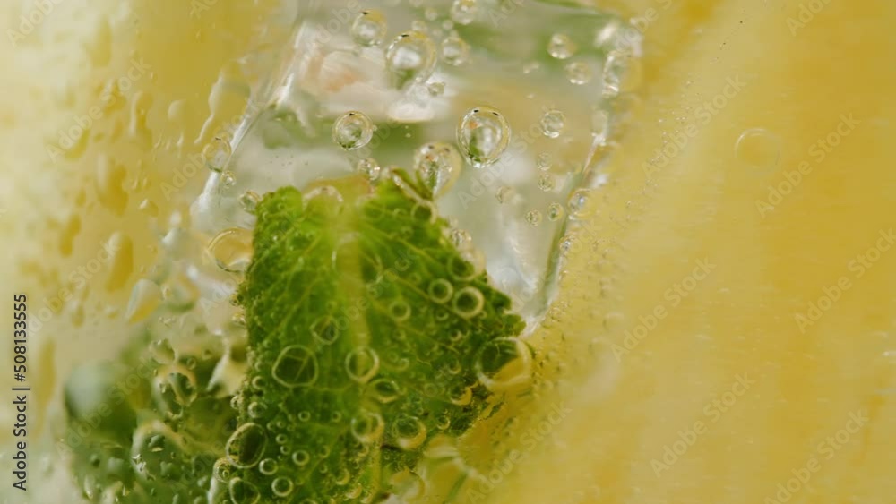Pineapple lemonade macro. Fruit ananas cocktail close-up texture, healthy sweet drink. Detox drinking, summer refreshment concept.