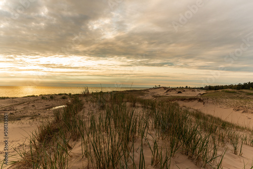 Grassy sand dunes and Lake Michigan at Sunset