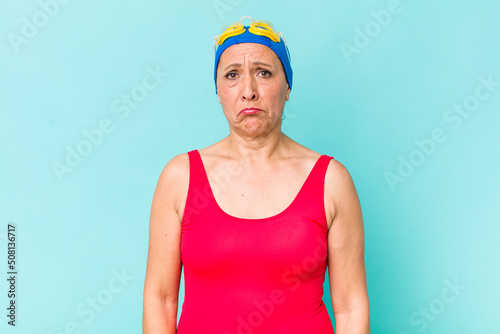 middle age woman feeling sad and whiney with an unhappy look and crying. swimming concept photo