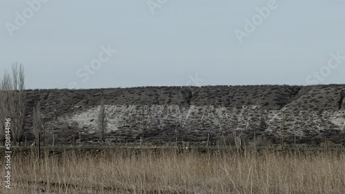 Patagonian Landscape, Hills  near Gaiman, in the Arid Argentine Patagonia, Chubut Province, Argentina. photo