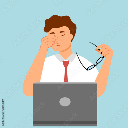 Office worker male holding glasses with headache symptom. Guy employee feel tired and fatigue from overload work. Problem at work.