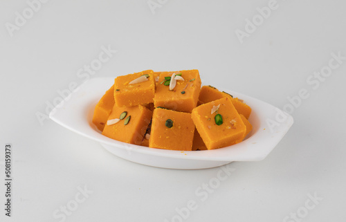 Indian Sweet Food Mango Burfi Made with fresh Mangos photo