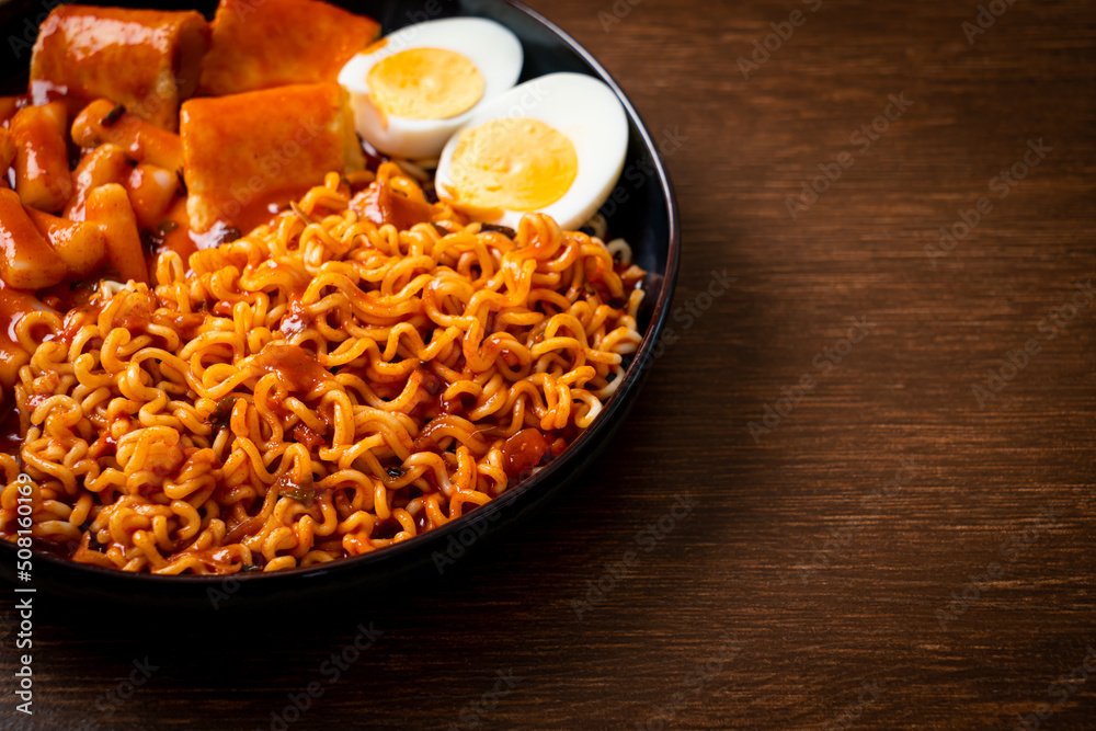 Korean instant noodles with Korean rice cake and fish cake and boiled egg Korean instant noodles with Korean rice cake and fish cake and boiled egg
