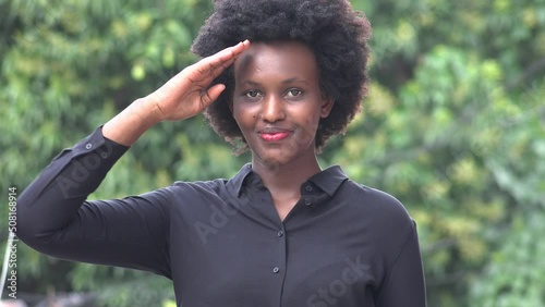 A Civilian Black Woman Saluting