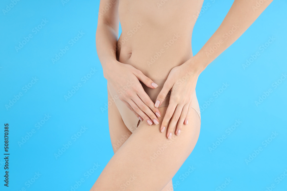 Concept of weight loss with thin girl on blue background Concept of weight loss with thin girl on blue background