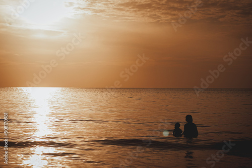 Dad and son in the sea. Happy Time