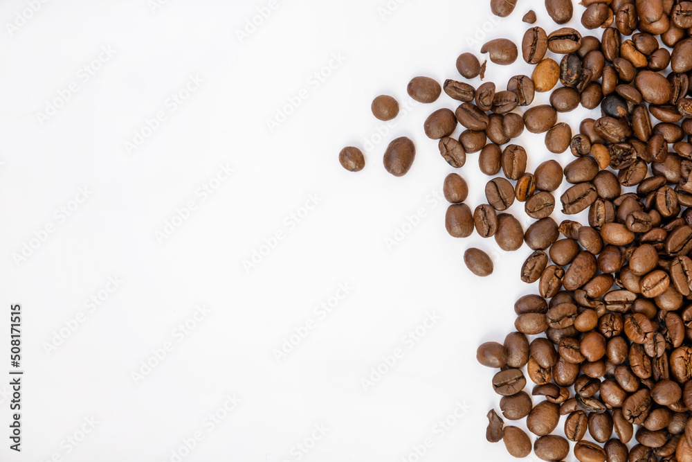 Coffee beans, border on a white background on the side Coffee beans, border on a white background on the side