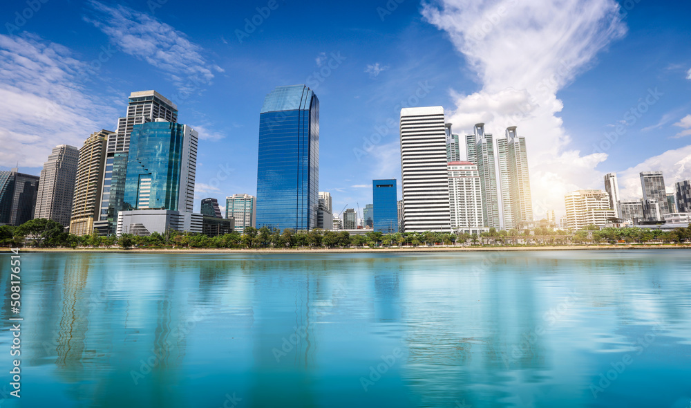 Fototapeta premium View of city landscape reflection on the river.