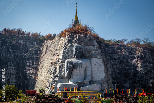 Luang Pho U Thong or Phra Phuttha Pusaya Khiri Sri Suvarnabhumi, Bhutsaya Khiri Suvarnabhumi, also known as Rock Buddha in Suphan Buri, Thailand photo