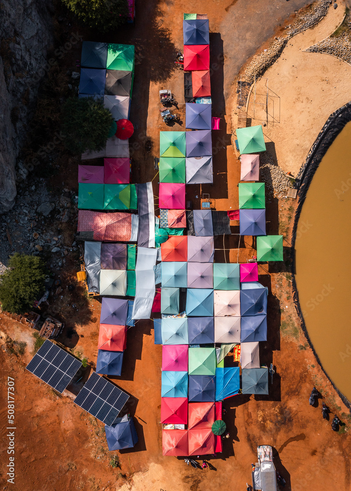 Aerial view of Luang Pho U Thong or Phra Phuttha Pusaya Khiri Sri Suvarnabhumi, Bhutsaya Khiri Suvarnabhumi, also known as Rock Buddha in Suphan Buri, Thailand