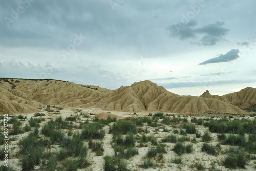 Bardenas Reales Natural Park with a semi-desert landscape with rock formations of clay, gypsum and sandstone, eroded by wind and rain, Bardenas Blancas area. Navarre, Spain