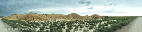 panoramic view of bardenas real nature reserve with a semi-desert landscape with rock formations of clay, gypsum and sandstone, Bardenas Blancas area. Navarre, Spain
