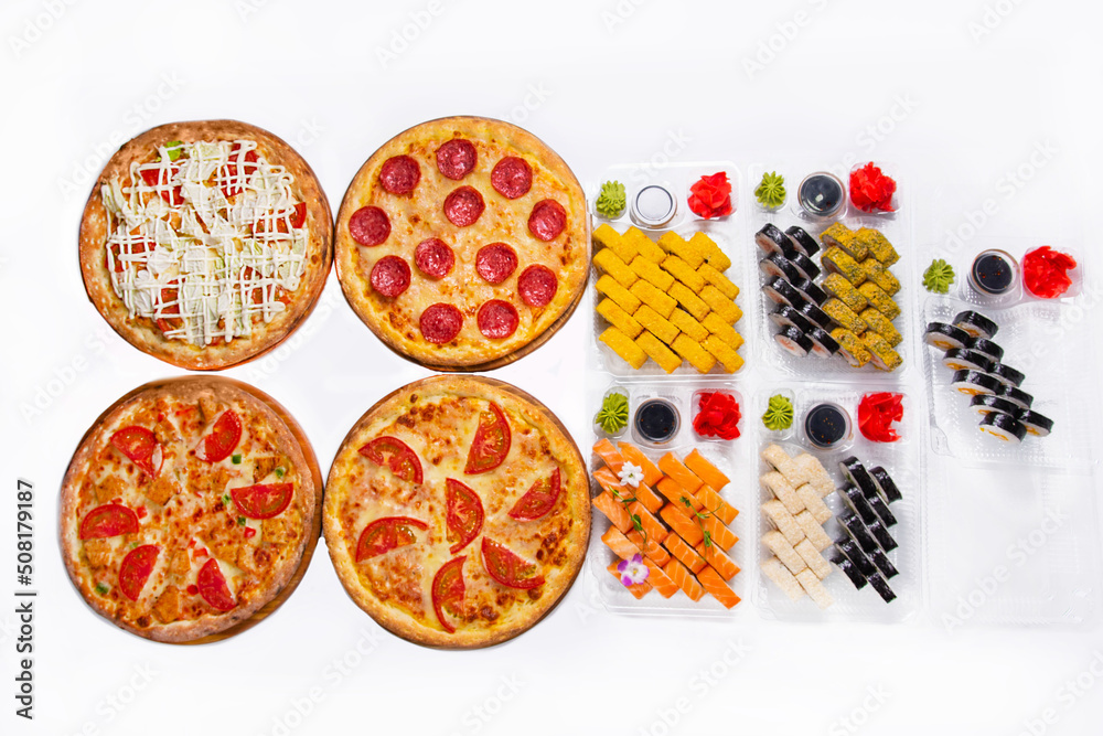 set. four pizzas with Japanese rolls, dried in plastic containers. on a white background