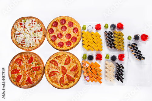 set. four pizzas with Japanese rolls, dried in plastic containers. on a white background