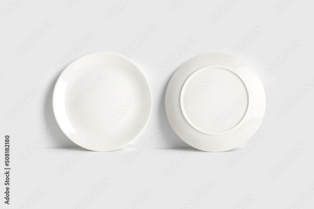 Empty blank white plate mockup isolated on white background. 3d rendering. front and back view