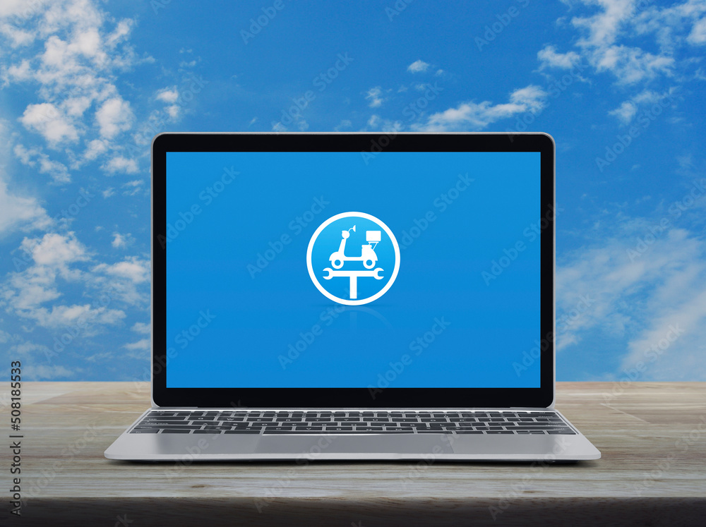 Service fix motorcycle with wrench tool flat icon on modern laptop computer screen on wooden table over blue sky with white clouds, Business repair motorcycle online service concept Service fix motorcycle with wrench tool flat icon on modern laptop computer screen on wooden table over blue sky with white clouds, Business repair motorcycle online service concept