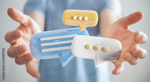 Businessman holding digital speech bubbles talk icons. Minimal conversation or social media messages floating between man hands. 3D rendering