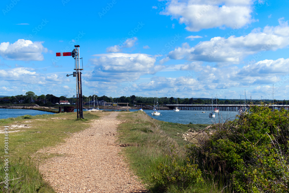 Langstone Harbour and the old Railway signal from the old Billy Line disused railway bridge that connected Hayling Island to the mainland photo.
