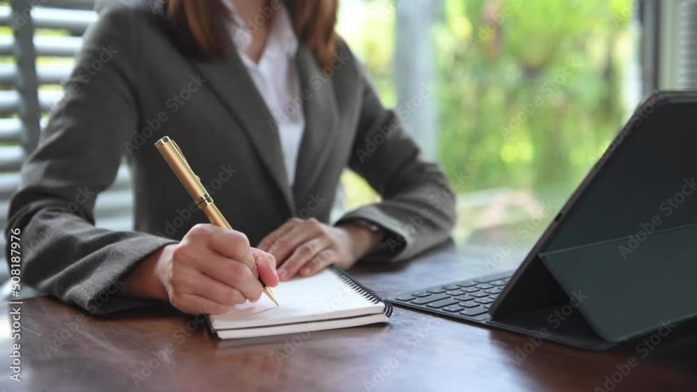 businesswoman hand working with new modern computer and writing on the notepad strategy diagram as concept at office
businesswoman hand working with new modern computer and writing on the notepad strategy diagram as concept at office