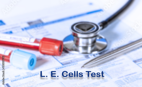L. E. Cells Test Testing Medical Concept. Checkup list medical tests with text and stethoscope