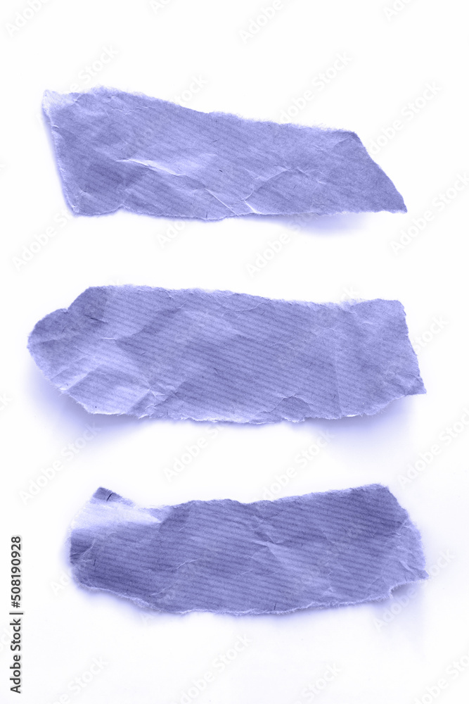 Recycled paper craft stick on white background. violet toned. Very peri