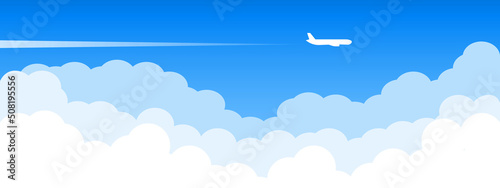 Airplane flying above clouds. Jet plane with exhaust white trail. Blue gradient and white plane silhouette. White and transparent clouds on the blue sky. jpg image