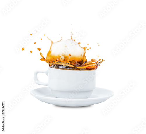 Aromatic coffee with splashes in a mug isolated