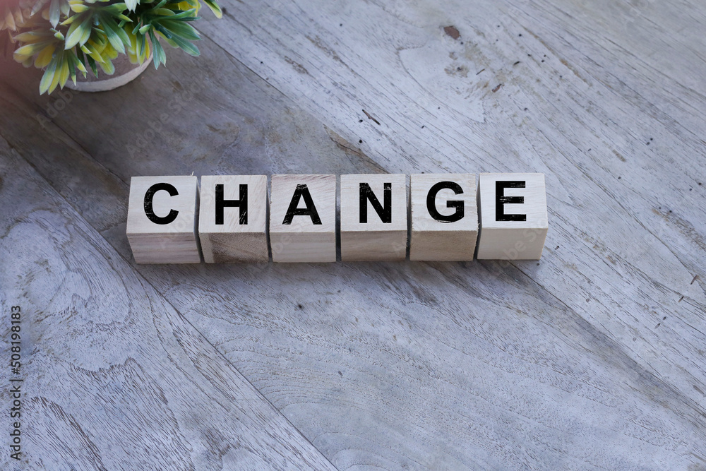 CHANGE text on wooden blocks on the wooden table
